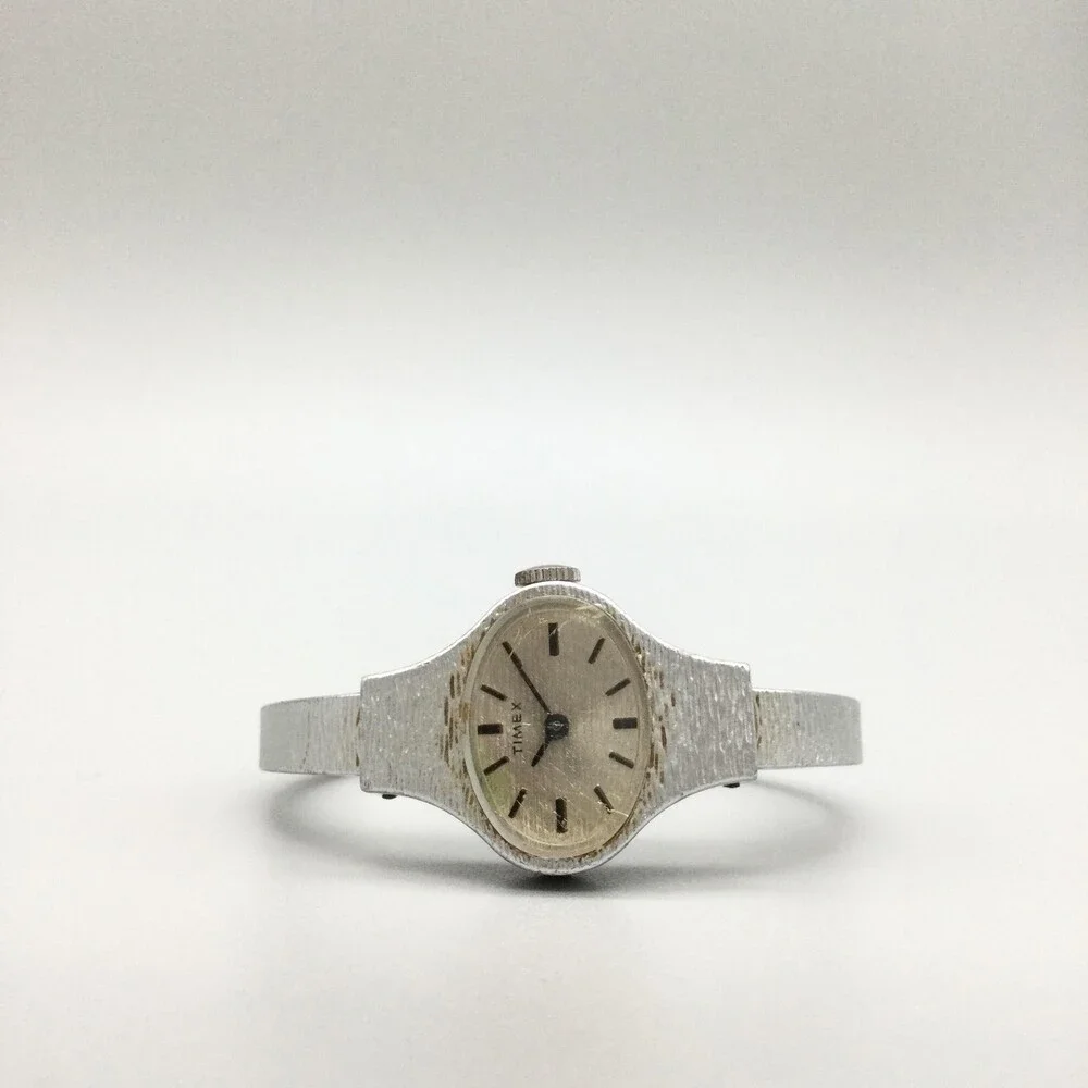 Vintage Timex Womens Watch 22mm Silver Tone Oval Dial Bangle Manual Wind